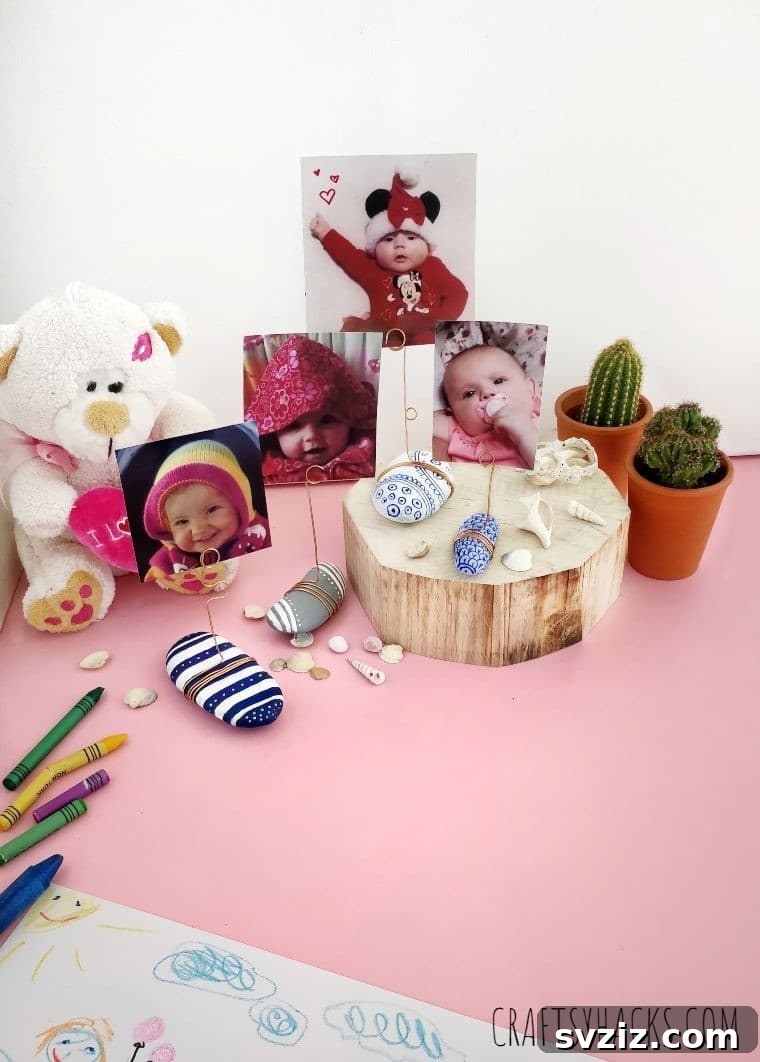 Display of various photos and cards held by DIY rock holders