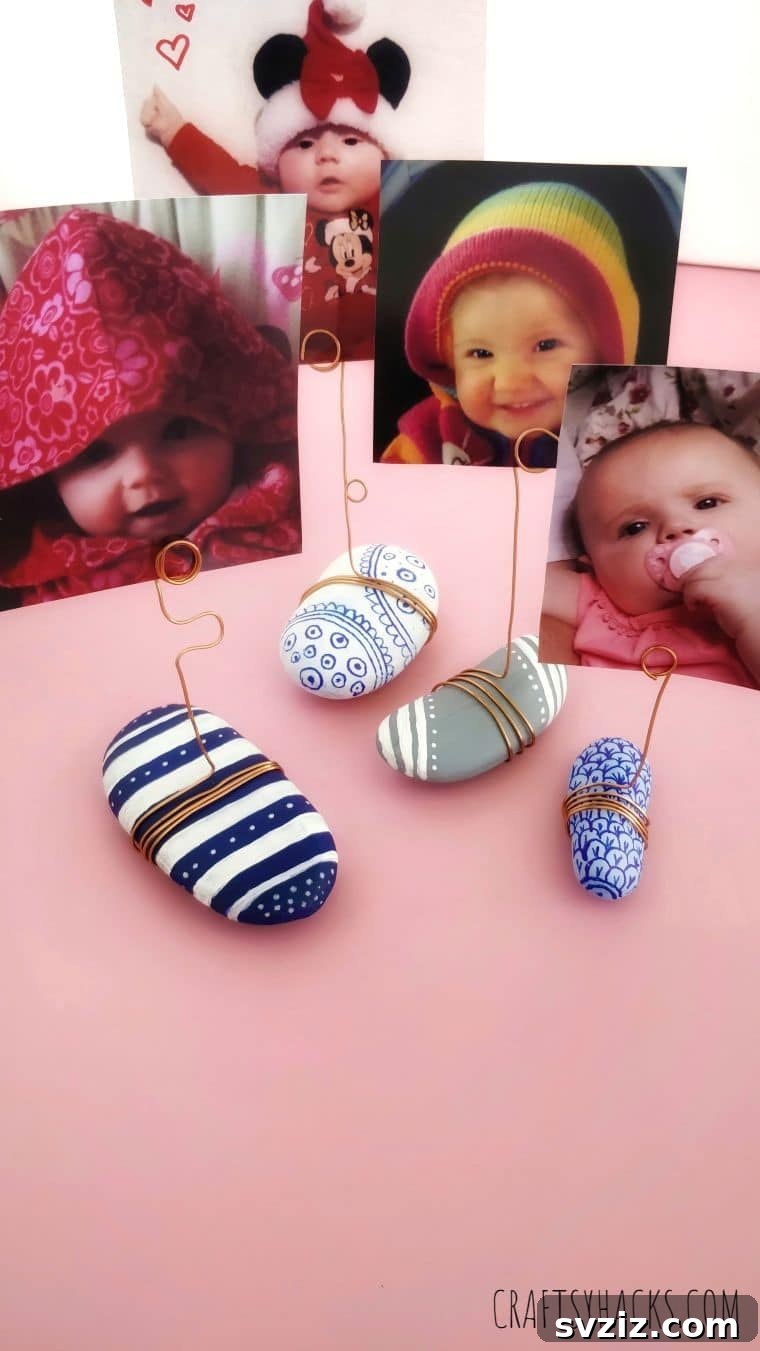 Close-up of a baby's photo displayed in a DIY rock holder