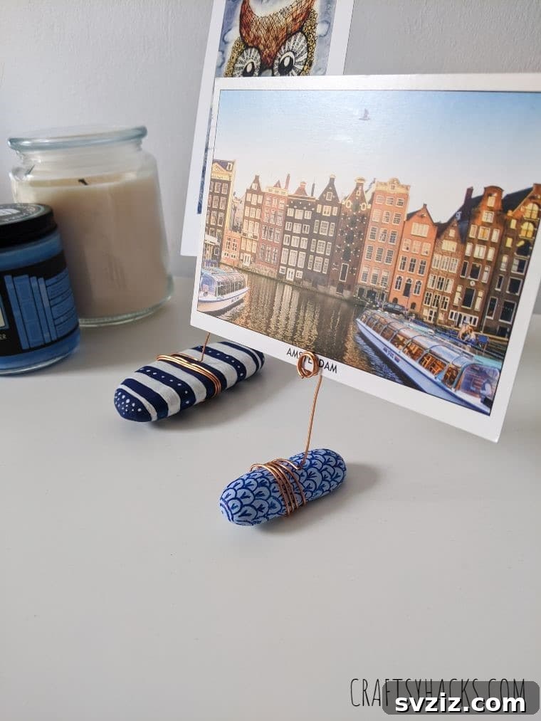 Postcard displayed in a DIY rock holder