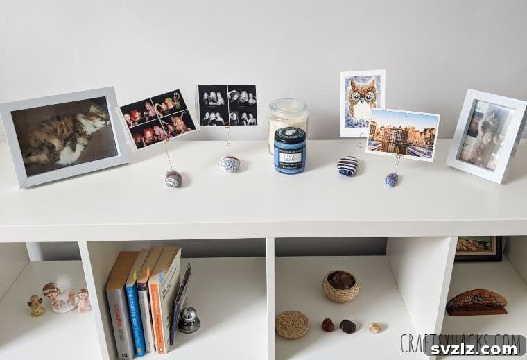 Close up of various upcycled rocks used as photo holders