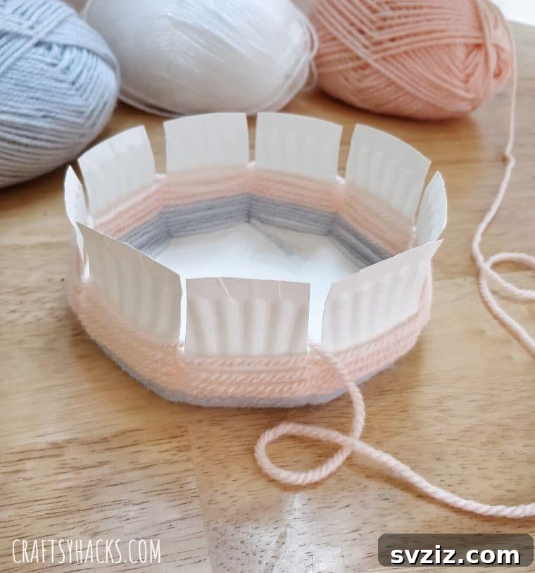 woven yarn on paper plate