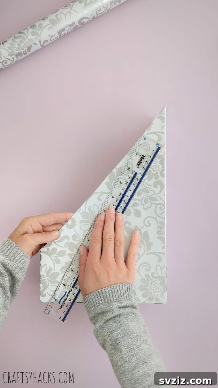 Measuring adhesive paper precisely for the DIY magazine organizer project to ensure full coverage