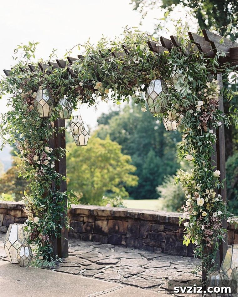Romantic Lanterns, Flowers, and Greens for an Arch Backdrop