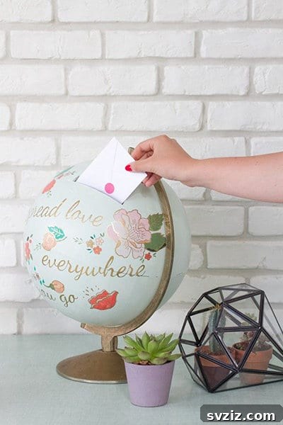 Painted globe as a wedding card holder