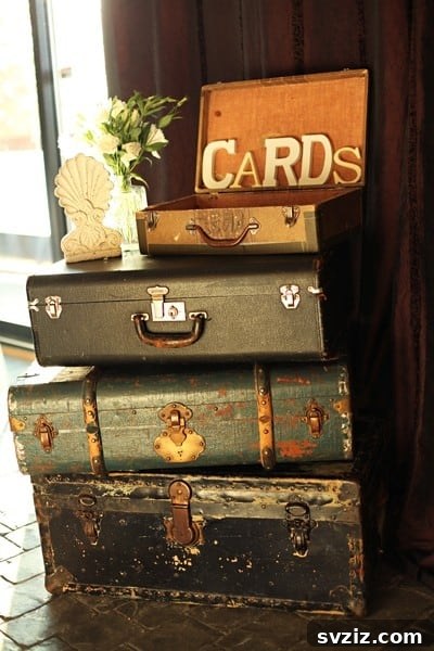 Stacked vintage luggage for wedding card holder