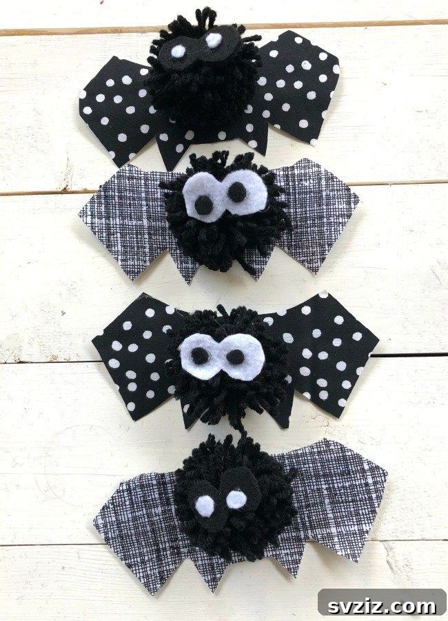 20 Spooktacular Halloween Decorating Ideas 12 DIY Super Cute Pom Pom Bats for Halloween