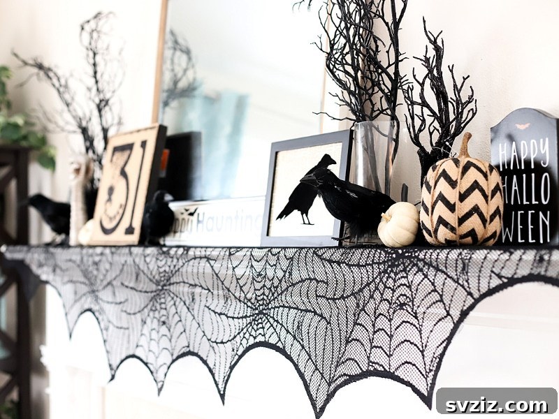 20 Spooktacular Halloween Decorating Ideas 22 Stylish Monochromatic Halloween Mantel Decor