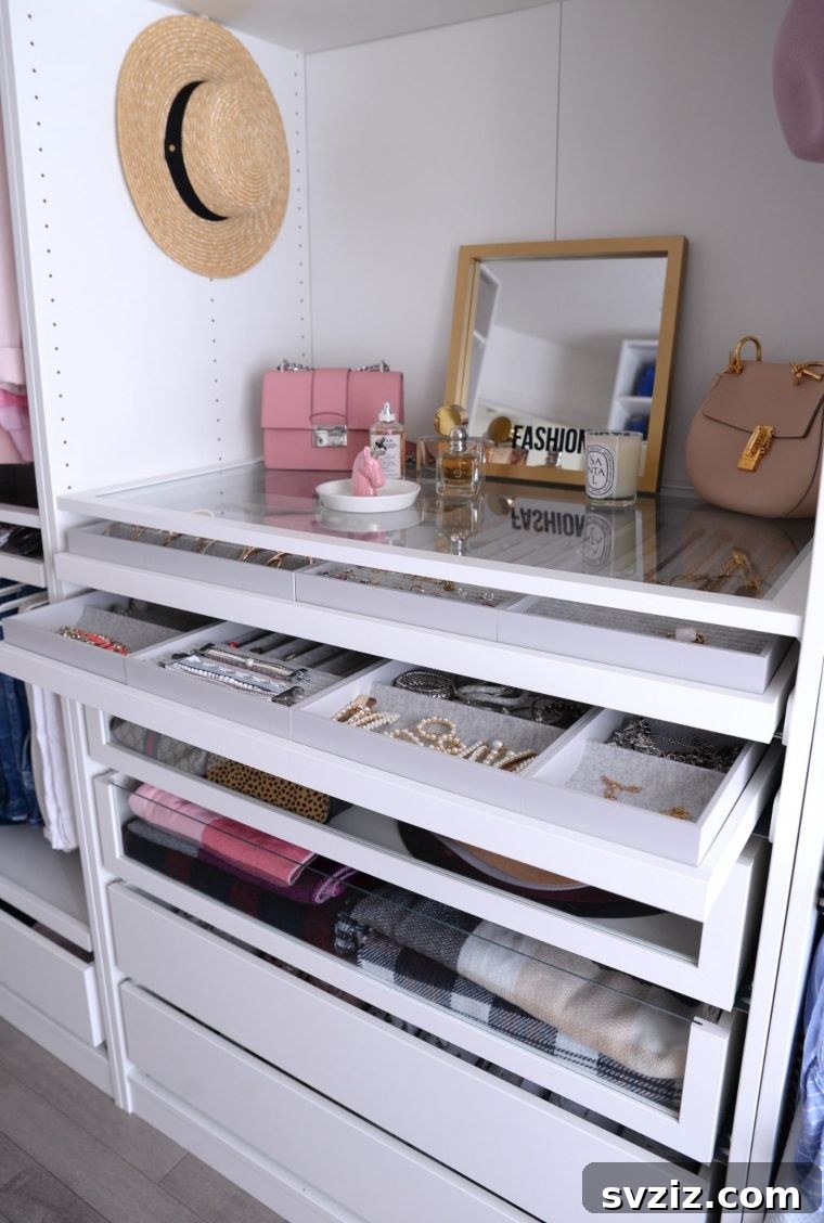 Velvet-wrapped hangers in a neatly organized closet drawer