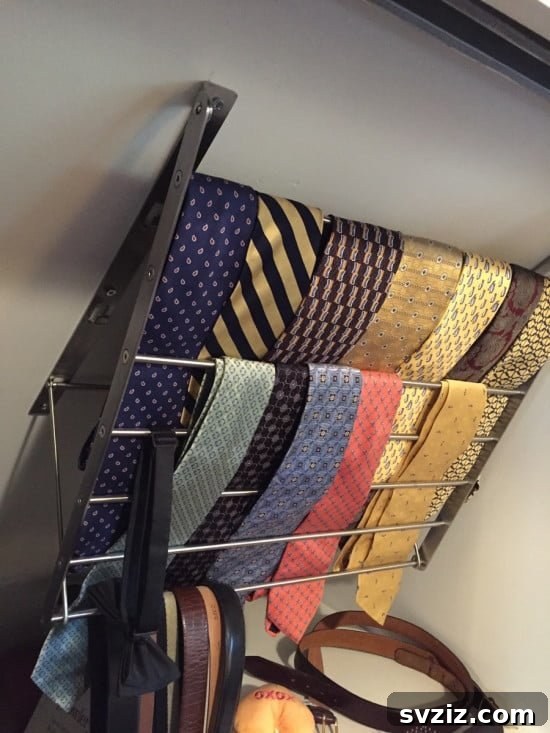 IKEA Grundtal Drying Rack repurposed as a tie hanger for sloping ceilings