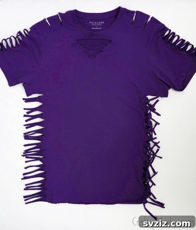 No-Sew T-Shirt Makeover 12 tying knots on shirt