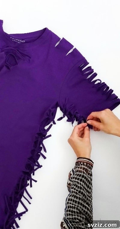 No-Sew T-Shirt Makeover 19 tying knots on sleeve