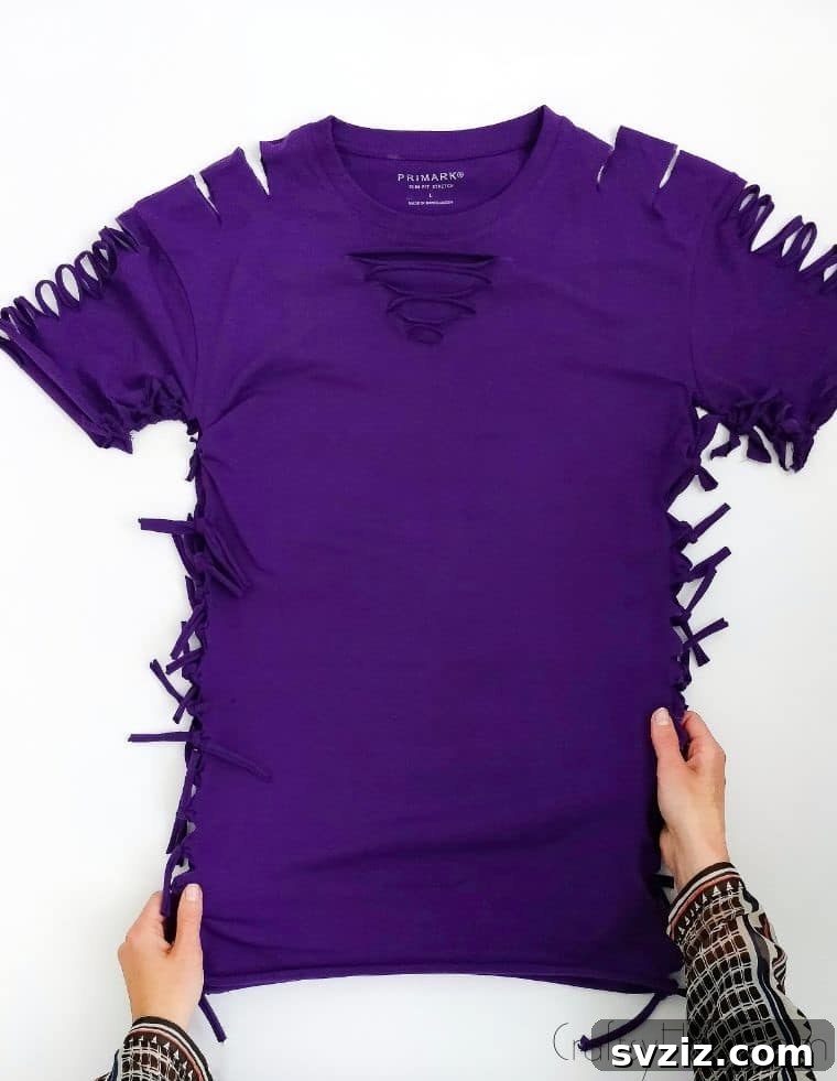 No-Sew T-Shirt Makeover 23 holding diy shirt