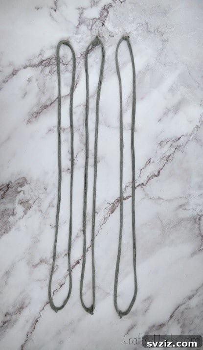 three stretched out loops