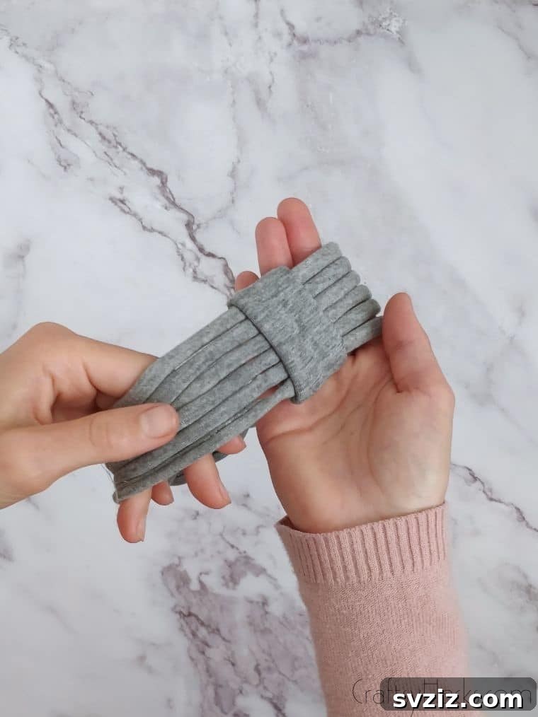 holding completed headband loop
