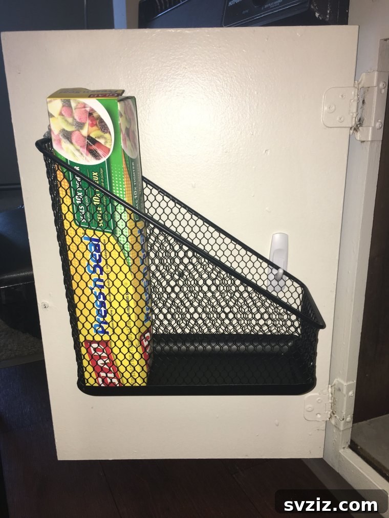 Create Storage Space in Cabinets with Command Hooks and a File Holder