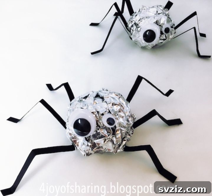 Spin a Web of Wonder: Spider Crafts for Your Little Bug Enthusiast 19 Shiny aluminum foil spiders with big googly eyes, a fun and easy craft using common household materials.