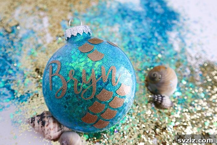 18 Magical Mermaid DIY Projects for Little Ariel Enthusiasts 20 Shimmering Mermaid Glitter Ornaments in clear globes, filled with colorful glitter for a magical holiday decoration.