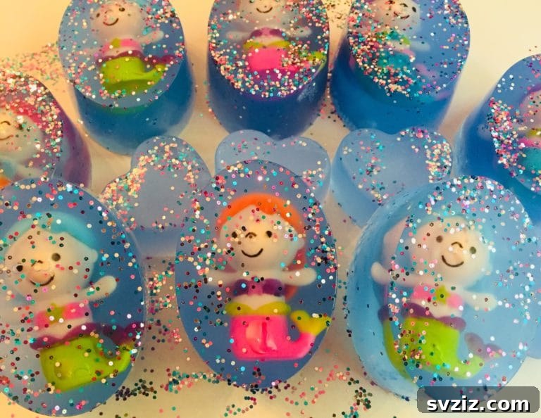 18 Magical Mermaid DIY Projects for Little Ariel Enthusiasts 7 Sparkling DIY Blue Glitter Mermaid Soap, featuring iridescent glitter embedded in clear soap, making bath time magical.