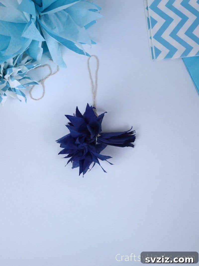 fanned out tissue paper pom poms