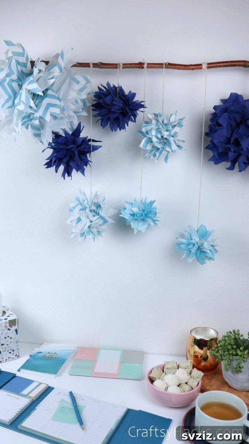 pom poms hanging from stick