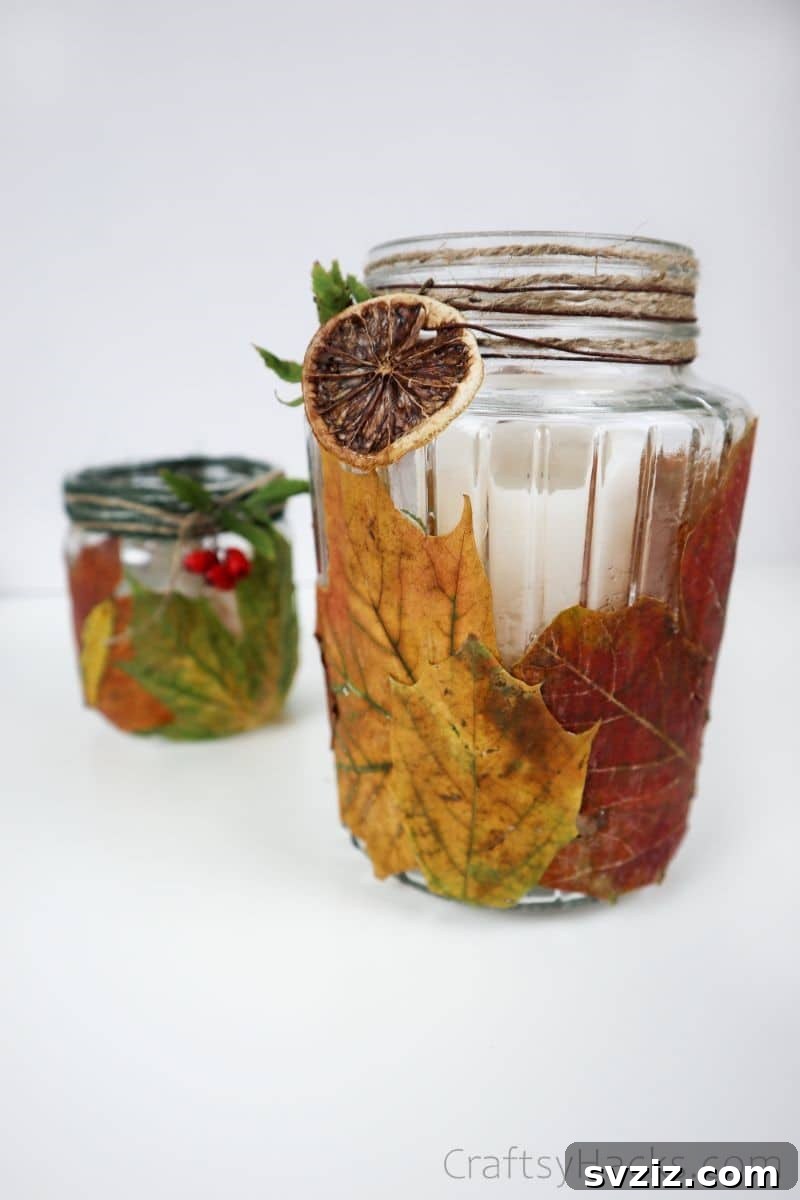 A beautifully crafted DIY leaf candle holder showcasing vibrant autumn leaves on a glass jar.