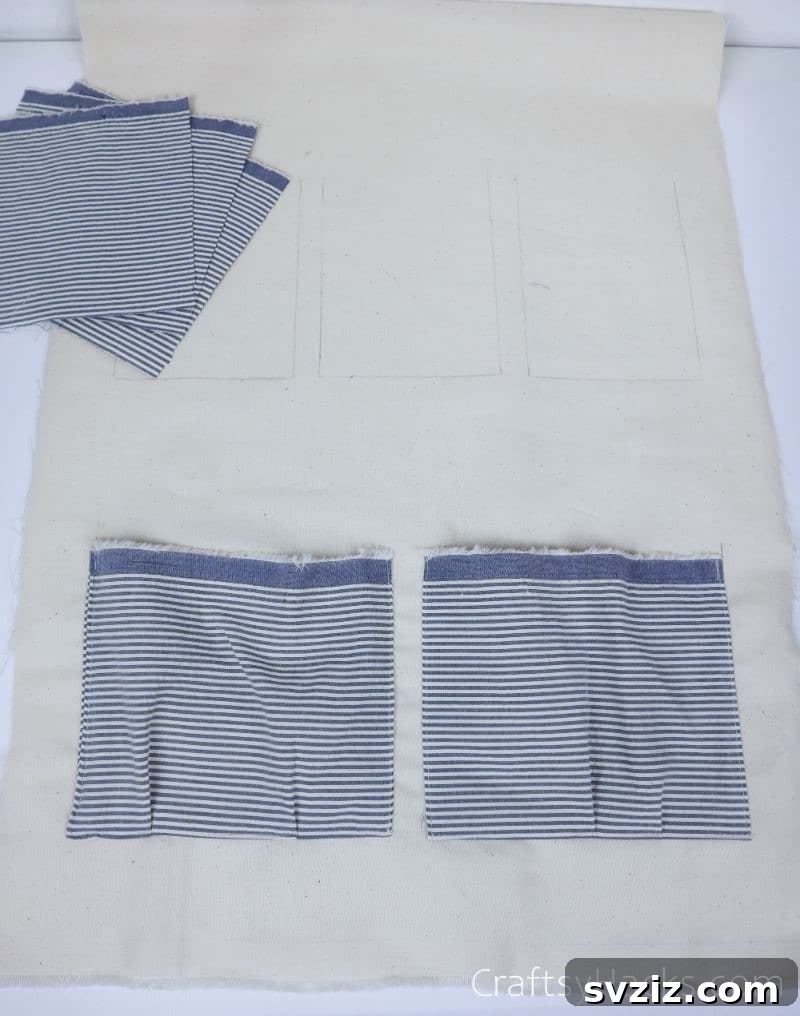 Two fabric pockets sewn onto the main organizer base
