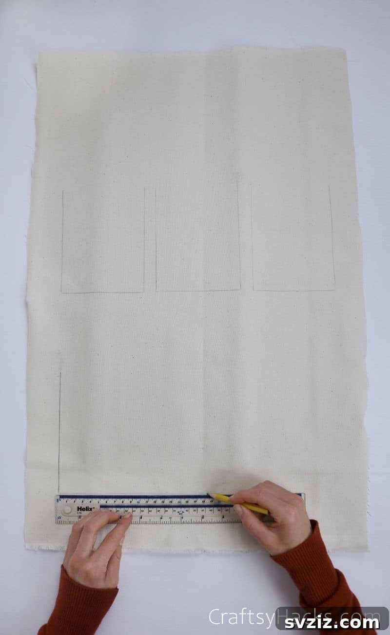 Marking lines on thick fabric with a ruler and pencil for the organizer base