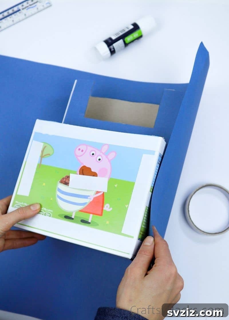 wrapping box in blue paper