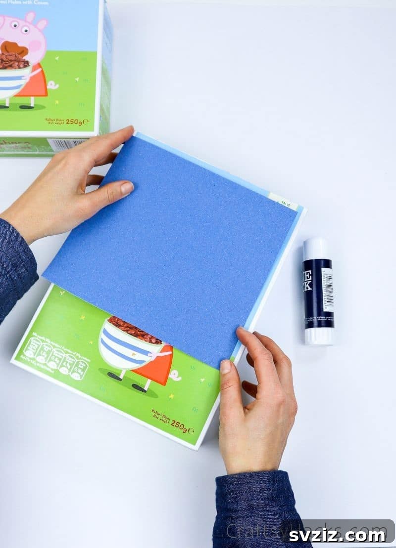 adding construction paper to organizer