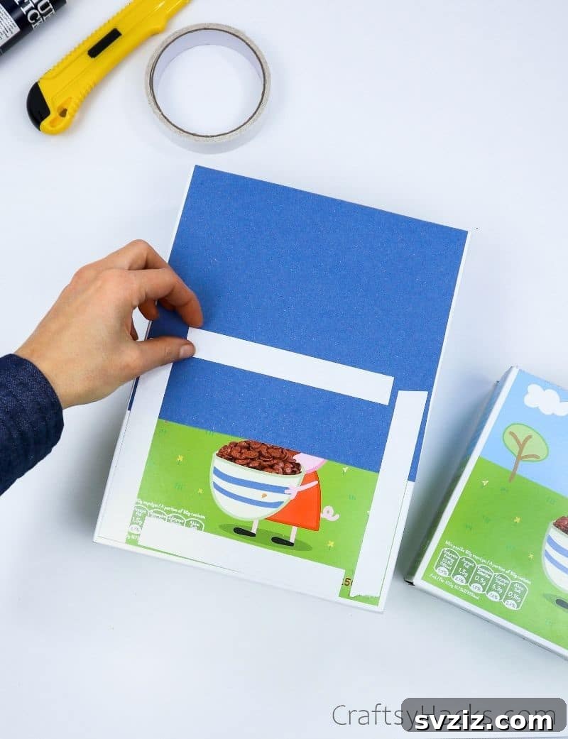 adding adhesive strips to organizer