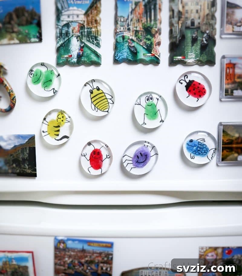 Fingerprint Keepsake Glass Magnets 3 A collection of colorful fingerprint magnets adorning a refrigerator, adding vibrant and personalized home decor.