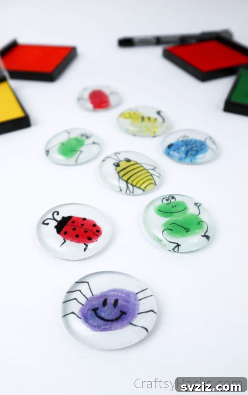 Fingerprint Keepsake Glass Magnets 9 Eight colorful fingerprint magnets displayed together, showcasing various animal designs and creative possibilities.