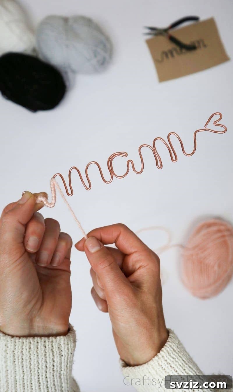 Stunning Wire Ornaments: Handmade Gifts You'll Adore 11 Wrapping pink yarn around a wire name ornament