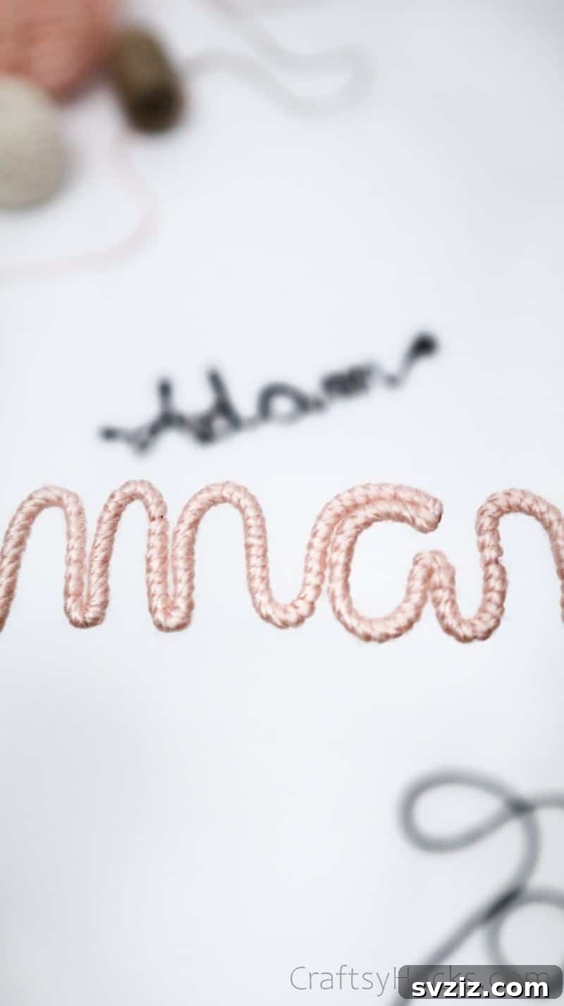 Stunning Wire Ornaments: Handmade Gifts You'll Adore 17 Close-up of a pink yarn-wrapped wire ornament