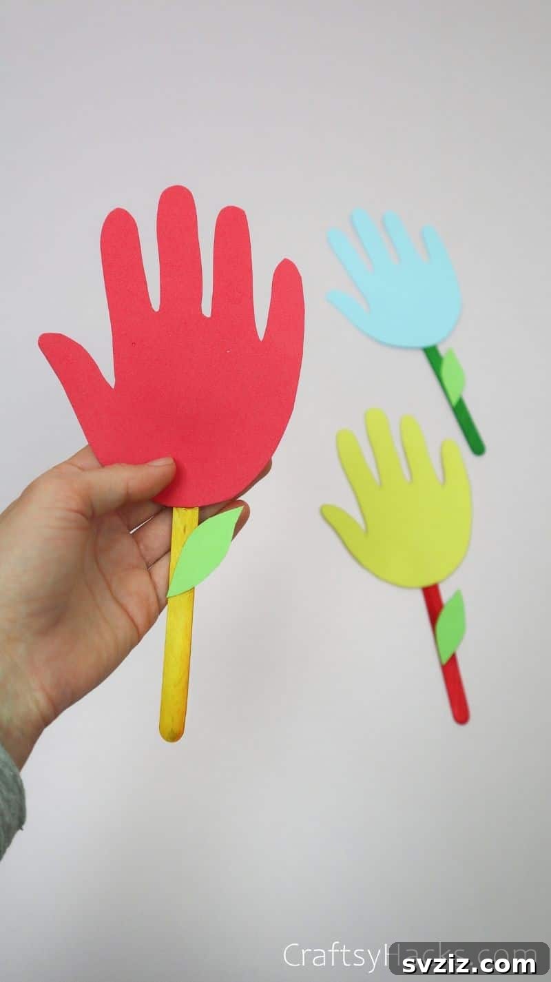 holding finished red kids bookmark