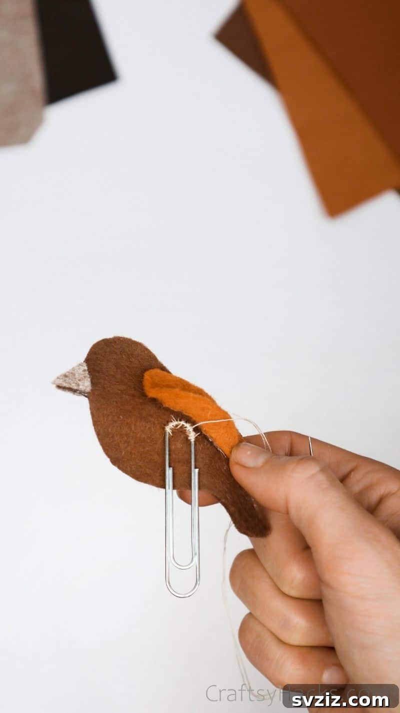 Creative Paper Clip Bookmarks 14 A finished felt bird bookmark with the paperclip securely sewn into place