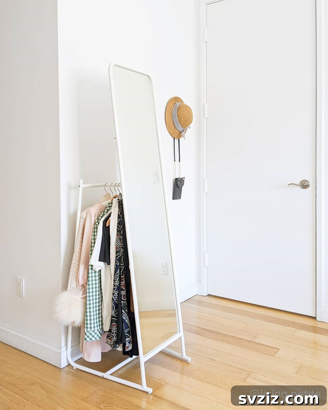 Mastering Micro Spaces: 40 Small Bedroom Organization Secrets 33 Behind-the-Mirror Clothes Hanger for discreet storage