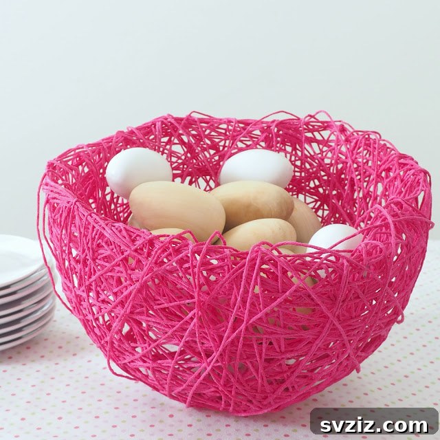 Creative Easter Projects for Adults 12 A unique serving bowl made from string, shaped like a bird's nest and filled with decorative eggs.