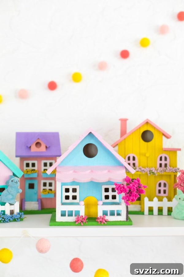 Creative Easter Projects for Adults 26 A delightful miniature Easter village featuring decorated birdhouses, colorful eggs, and spring accents.