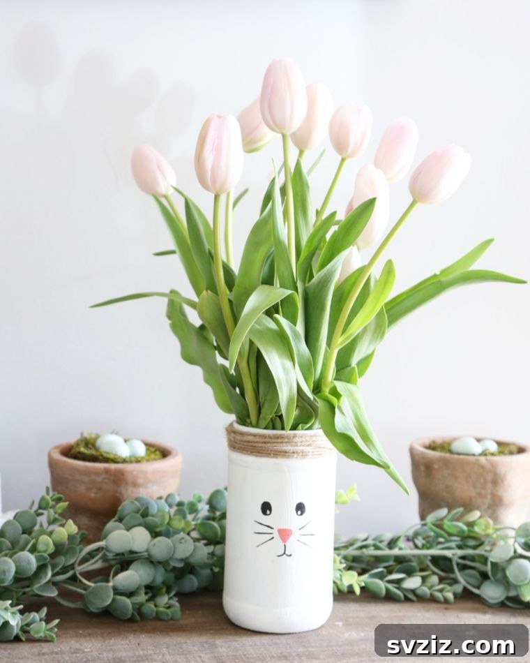 Creative Easter Projects for Adults 6 Charming white bunny vases made from recycled glass jars, decorated with simple bunny faces and twine.