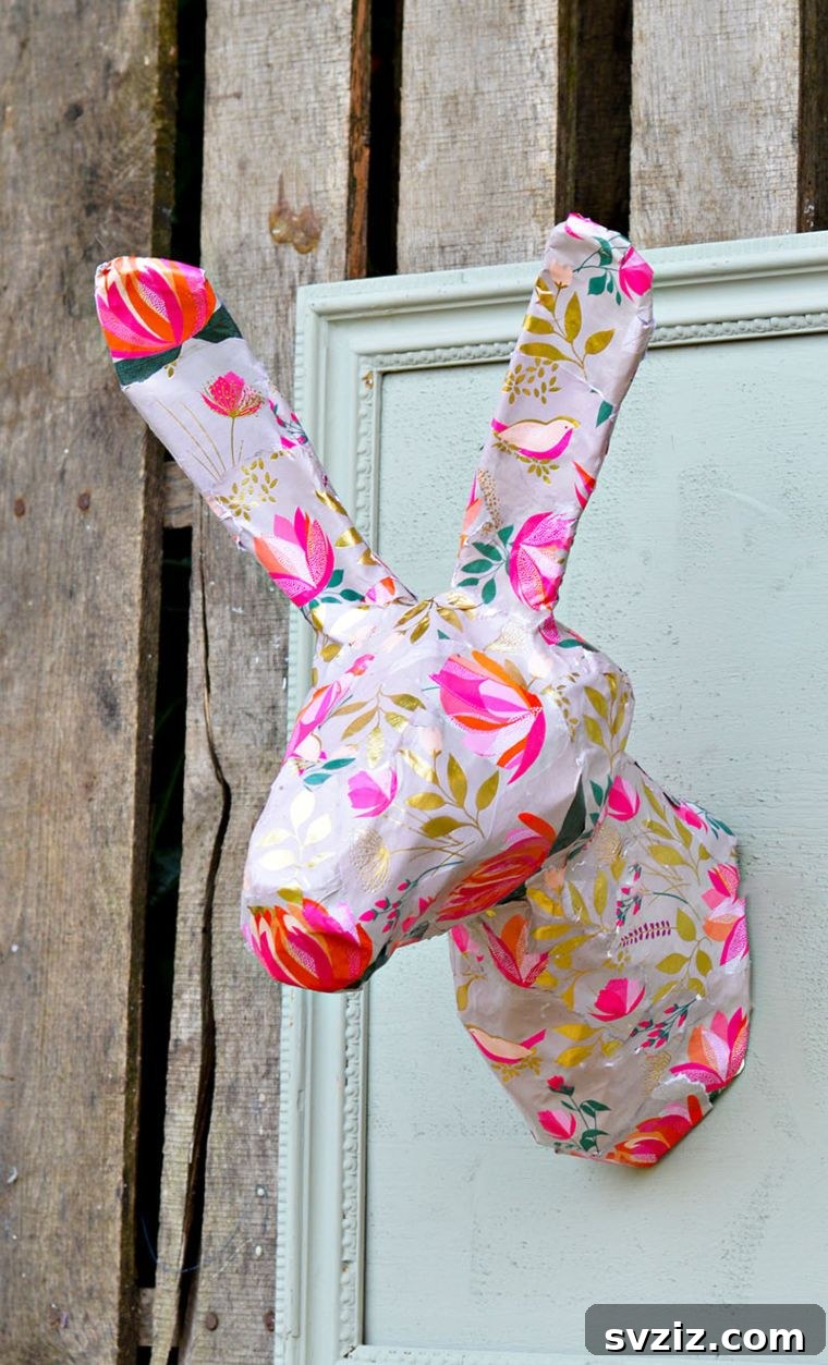Creative Easter Projects for Adults 8 A stylish papier-mâché rabbit head art piece, mimicking a mounted animal bust, in a modern home.