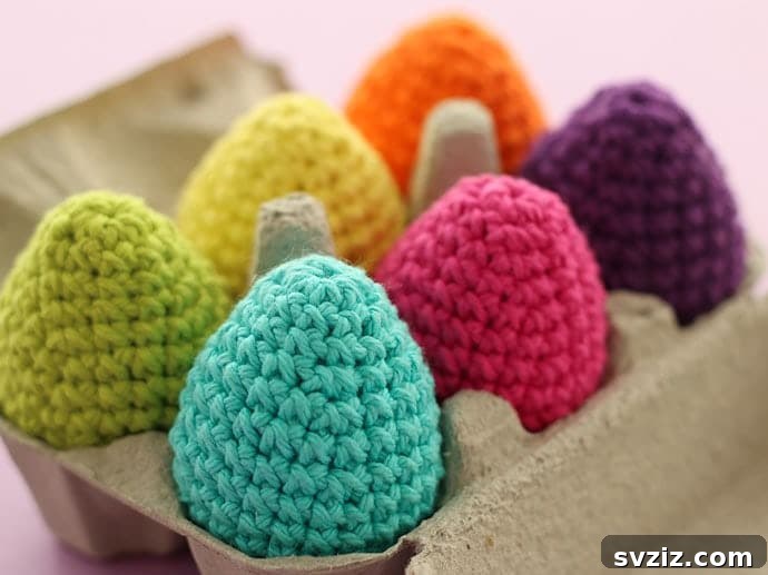 Creative Easter Projects for Adults 10 A collection of colorful crocheted Easter eggs displayed in a glass vase and an egg carton.