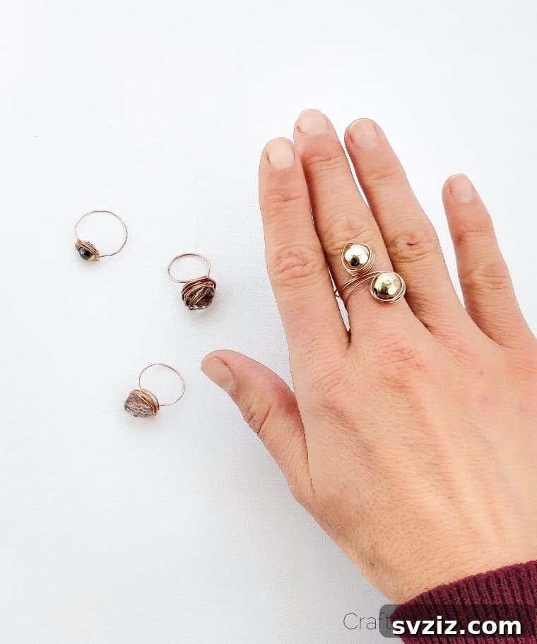 27 DIY Rings You'll Never Want to Take Off 11 Chic DIY duo-bead wire rings with beads threaded on each end, creating a stylish look.