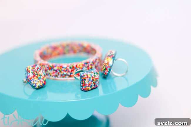 27 DIY Rings You'll Never Want to Take Off 12 Whimsical DIY resin sprinkle rings resembling miniature birthday cakes.