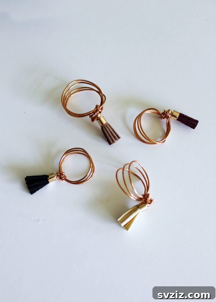 27 DIY Rings You'll Never Want to Take Off 3 Bohemian-inspired DIY wire ring adorned with delicate leather tassels.