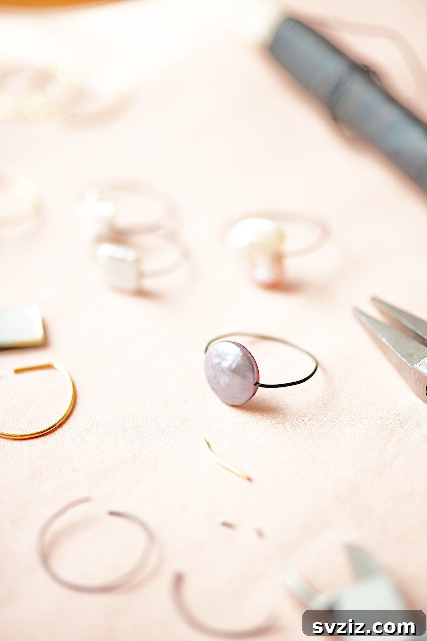27 DIY Rings You'll Never Want to Take Off 25 Elegant DIY simple filigree wire ring featuring a pearl or bead centerpiece.