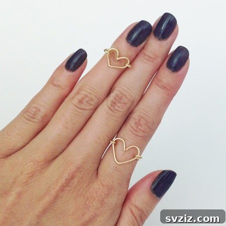 27 DIY Rings You'll Never Want to Take Off 4 Delicate DIY wire ring shaped into a minimalist heart design.