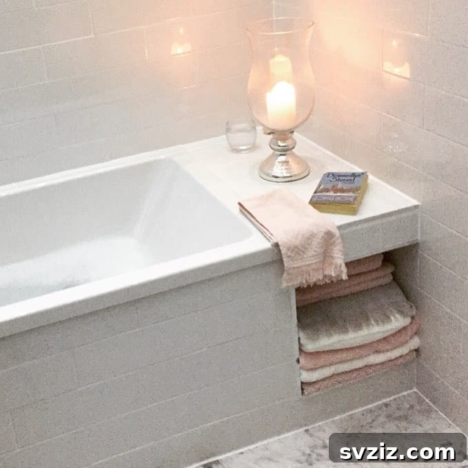 Towel Tunnel integrated into bathtub for clever storage