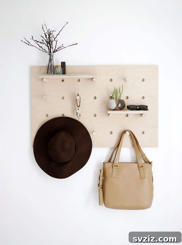 Wooden Pegboard Wall Organizer for hats and accessories, a versatile and modular storage solution.
