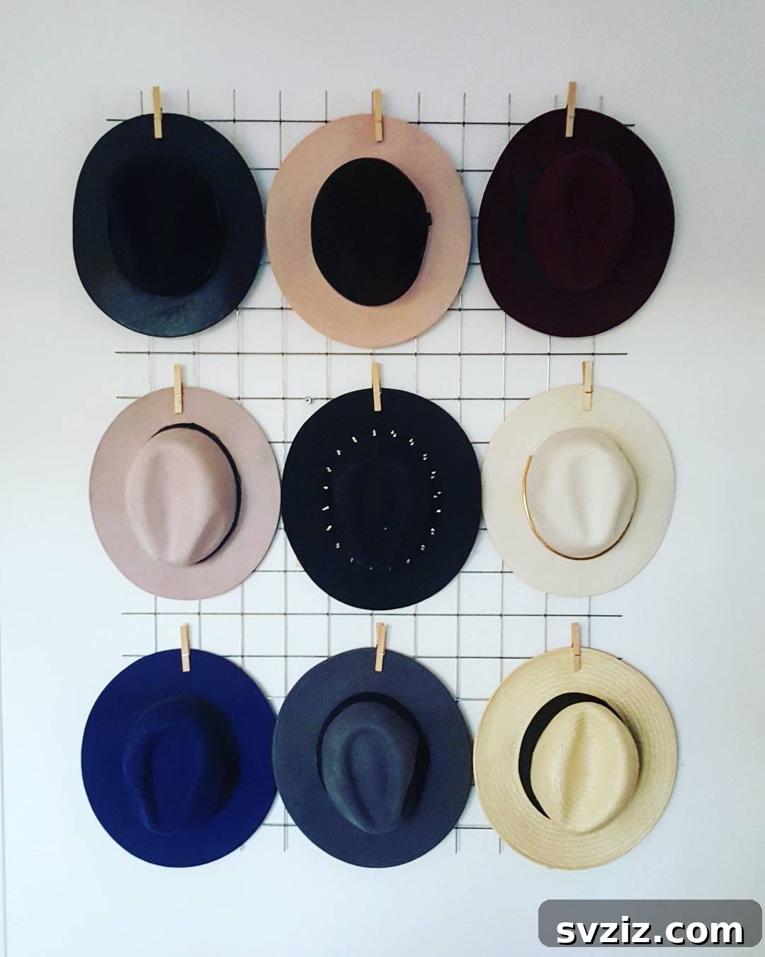 Simple Hat Grid with wooden clothes pegs, reflecting Scandinavian minimalist style.